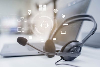 laptop and headphones with abstract images
